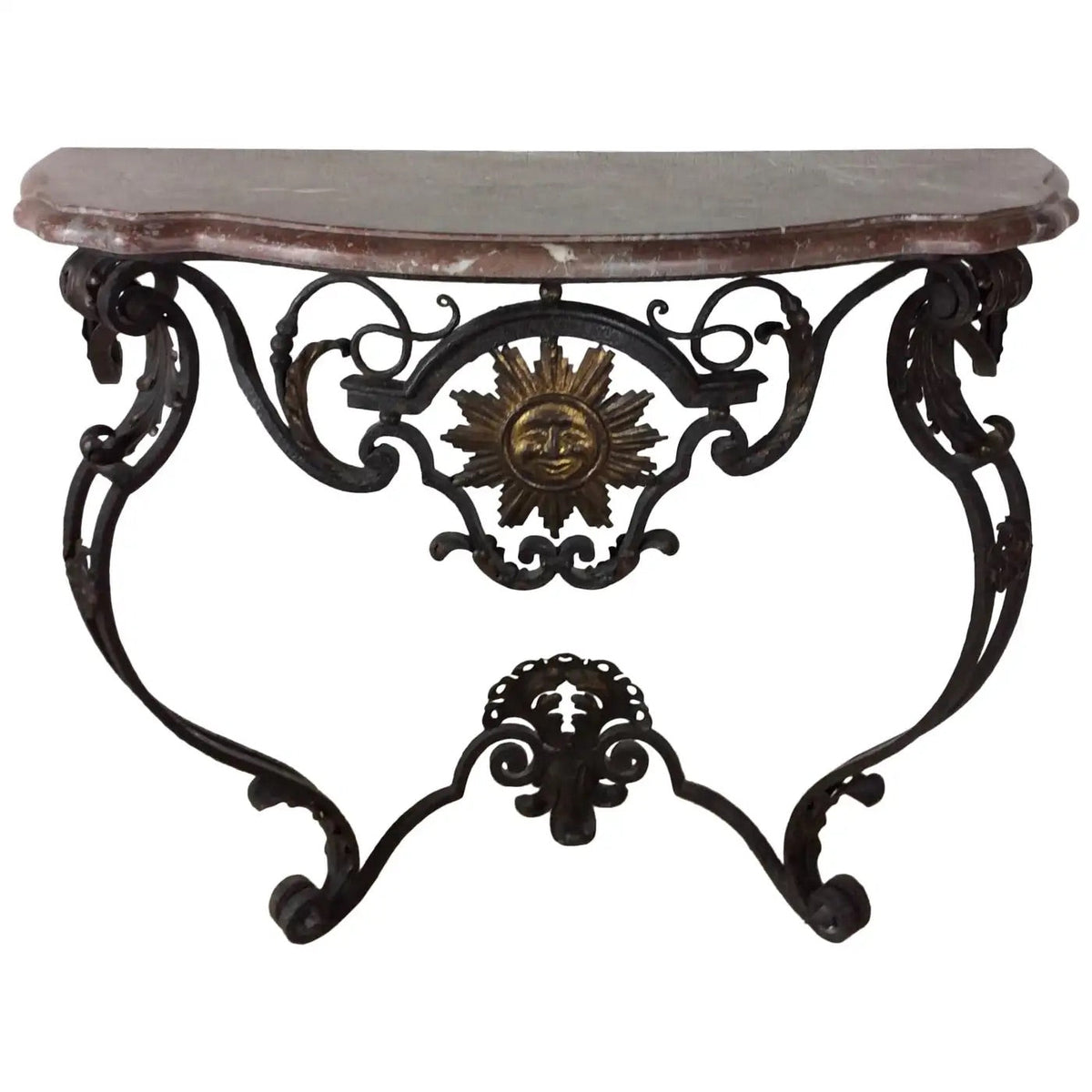 Wrought iron wall console in the Louis XIV manner with carved sun symbol and fleur-de-lis, serpentine marble top