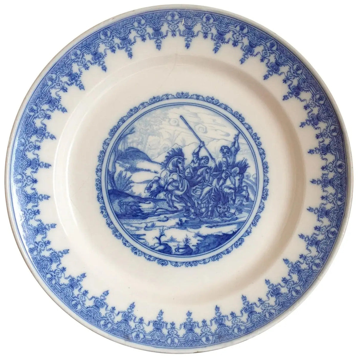 Large French Moustiers faience charger painted in blue camaieu with a hunting scene after Antonio Tempesta, 18th century