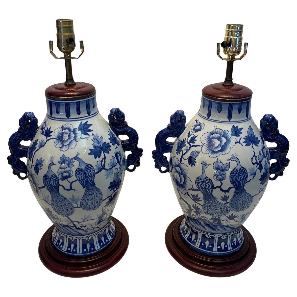 Pair of Blue and White Chinoiserie Porcelain Urn Table Lamps with Peacock Motifs