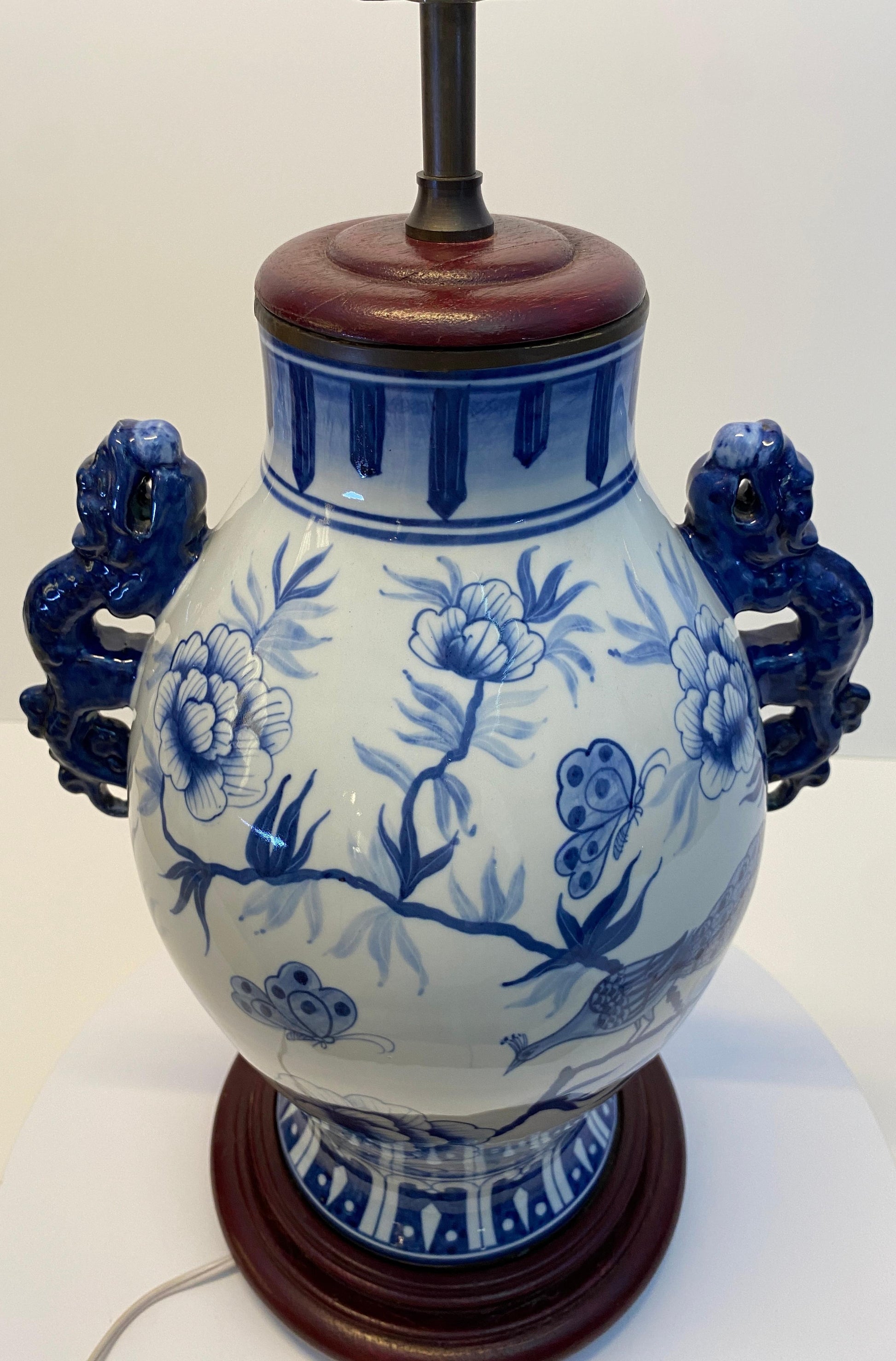 Pair of Blue and White Chinoiserie Porcelain Urn Table Lamps with Peacock Motifs — detail 4
