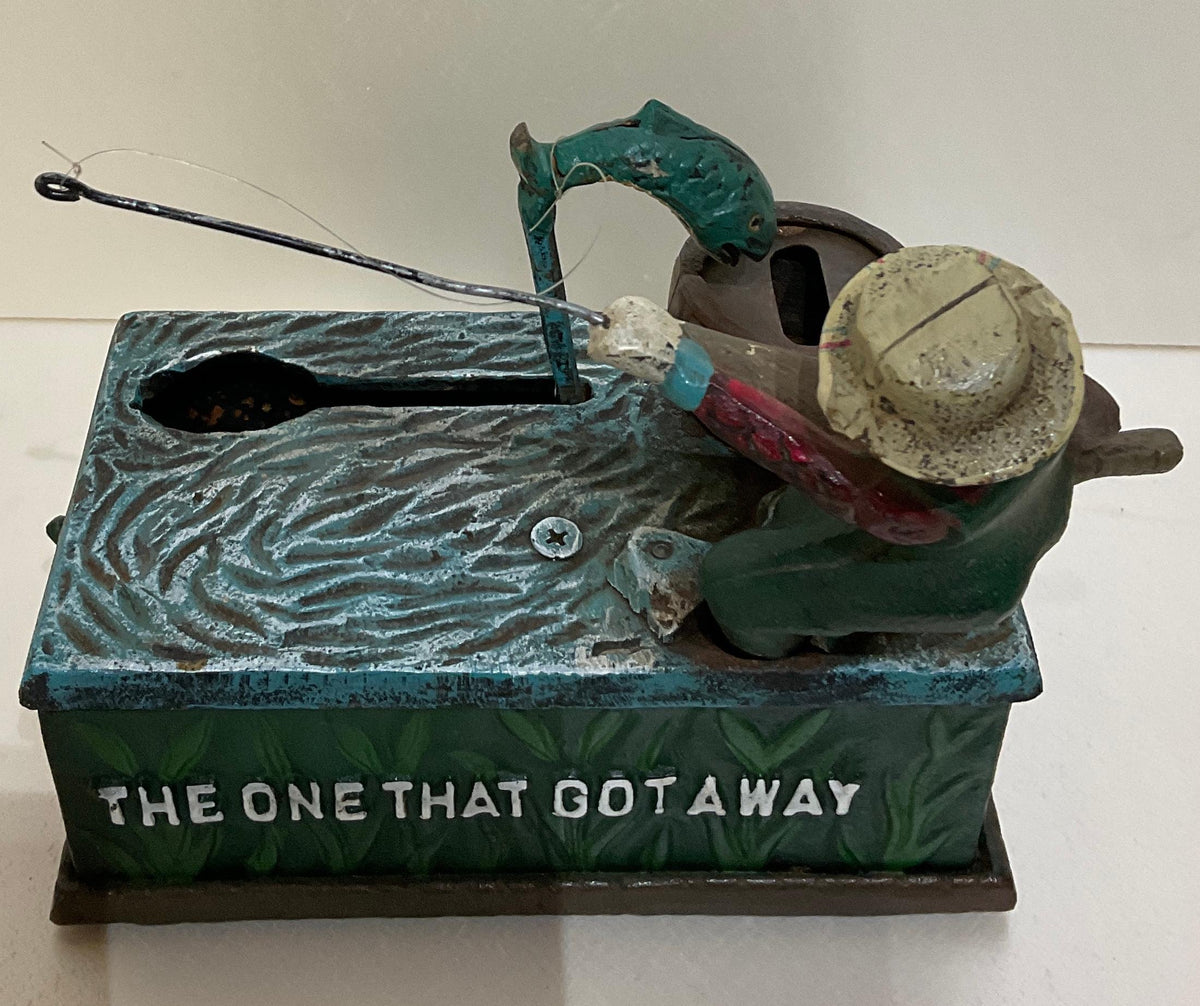 Antique Cast Iron Penny or Money Bank Boy Fishing Marked "The One That Got Away" — detail 5