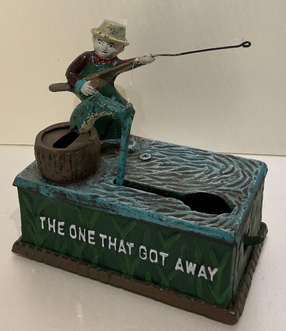 Antique Cast Iron Penny or Money Bank Boy Fishing Marked "The One That Got Away" — detail 4